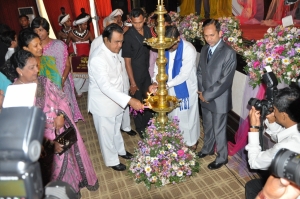 Int Women Day Lighting of traditional oil lamp